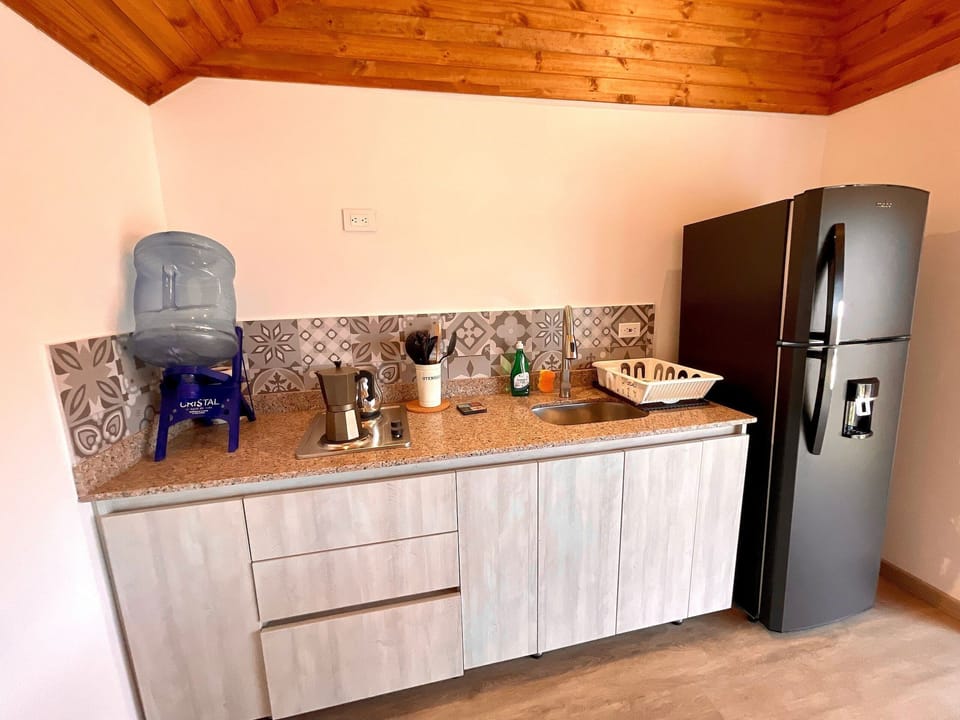 Cabin | Private kitchen | Fridge, cookware/dishes/utensils