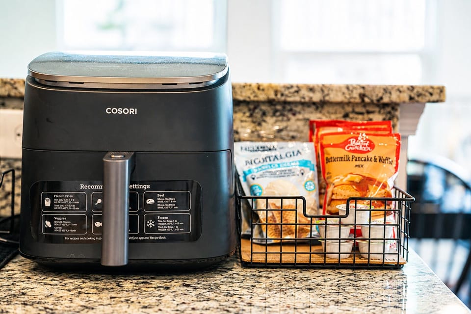 Modern kitchen setup with air fryer and breakfast essentials