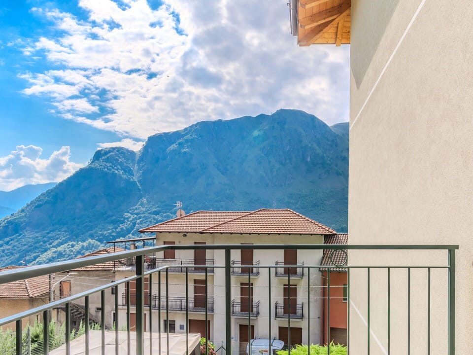 Cloud, Sky, Daytime, Plant, Window, Mountain, Blue, Building, Wood, Shade