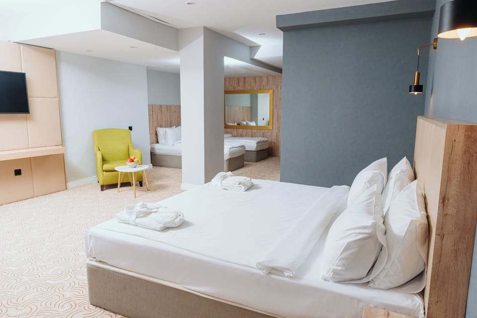 Deluxe Quadruple Room | Egyptian cotton sheets, premium bedding, down comforters, minibar