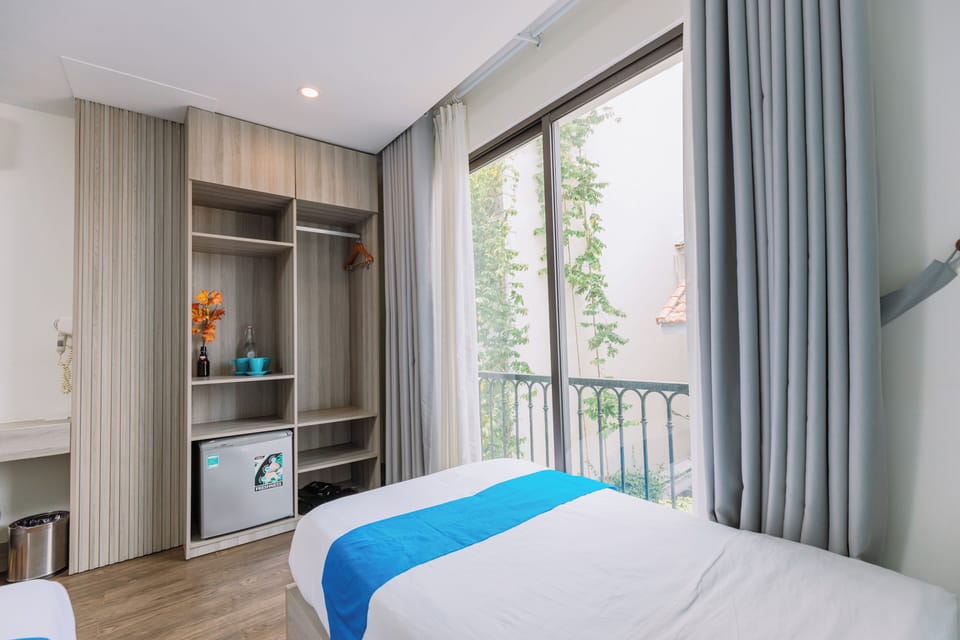 Deluxe Double or Twin Room, Balcony | Premium bedding, minibar, laptop workspace, soundproofing