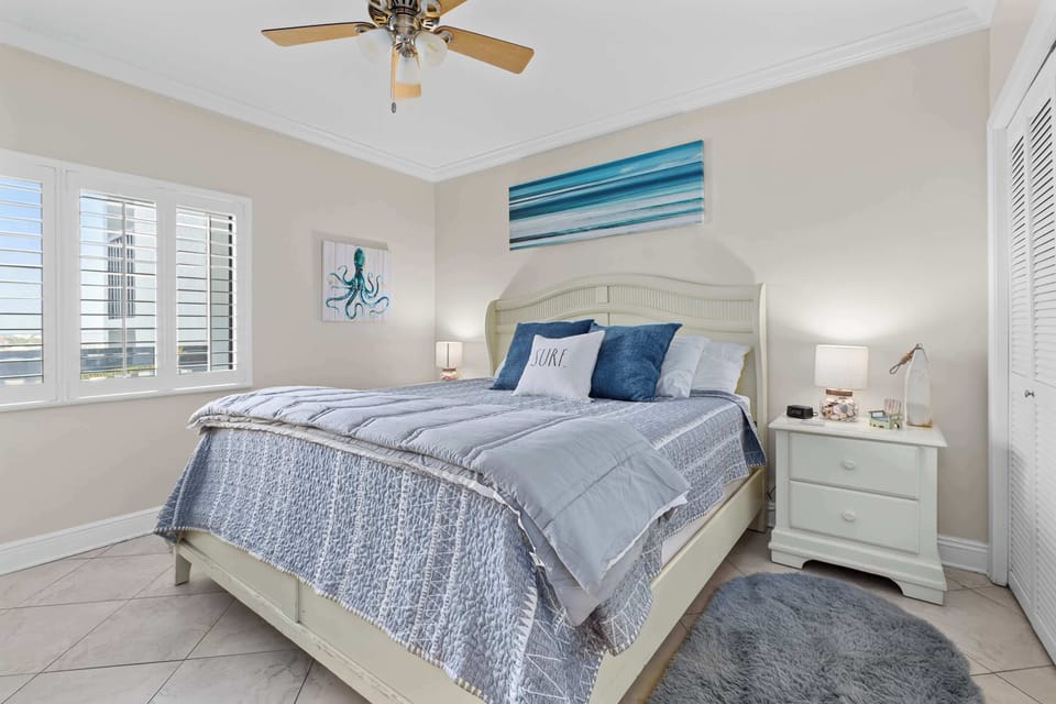 Bedroom 2 includes a king bed and another en-suite bathroom. 