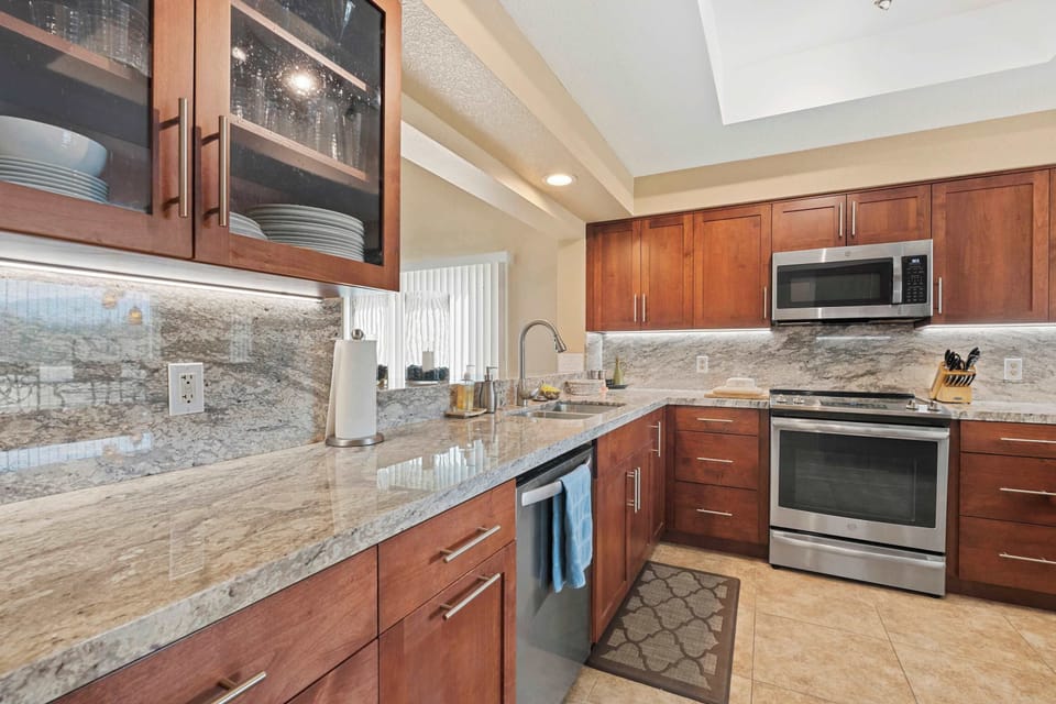The warm, inviting kitchen offers ample space & every home comfort