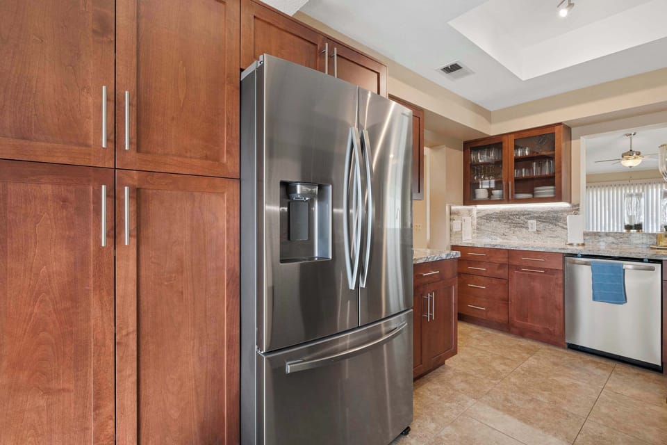 The warm, inviting kitchen offers ample space & every home comfort