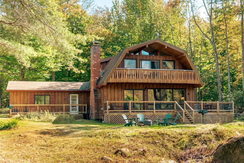 Discover ADK Whiteface Chalet, a tranquil retreat on 2 beautiful acres, just minutes from Whiteface Mountain and Lake Placid.
