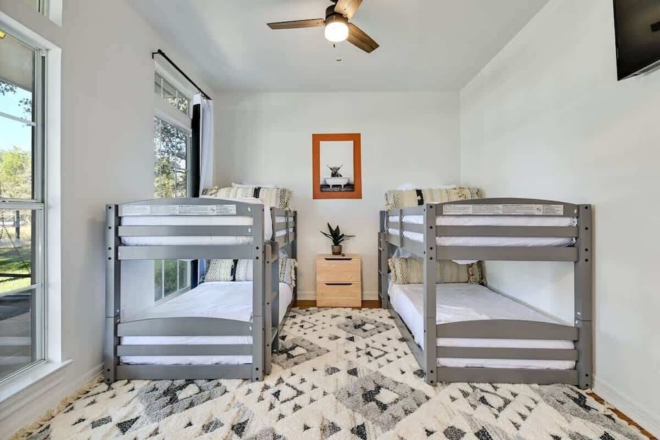 House, Multiple Beds, Pool Access, Pool View (209 Peabody) | 6 bedrooms, desk, laptop workspace, individually decorated