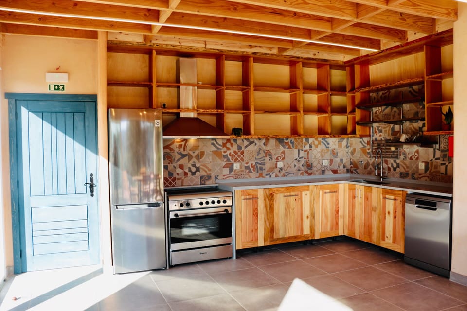 Full-size fridge, dining tables