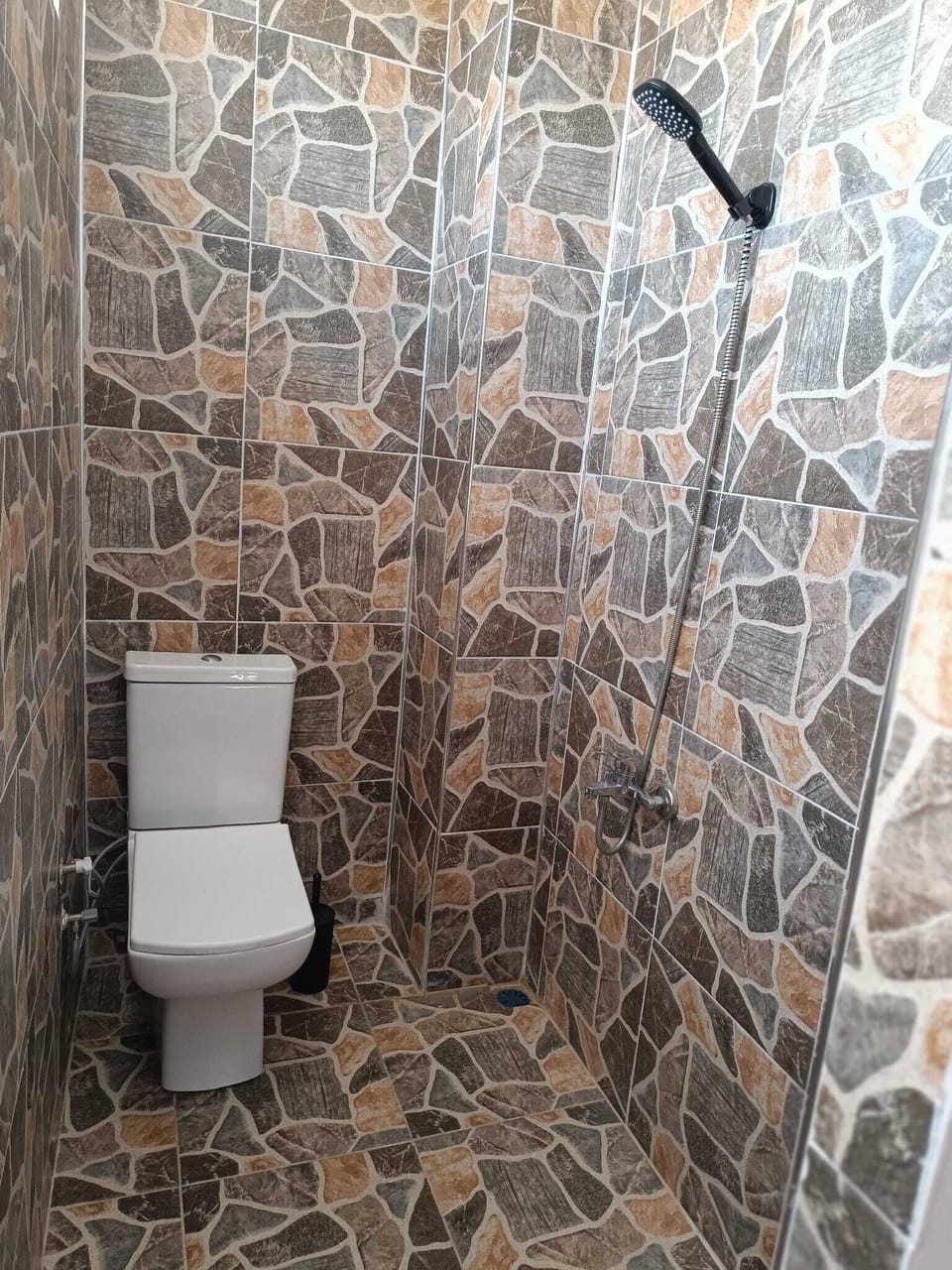Shower, slippers, towels, soap