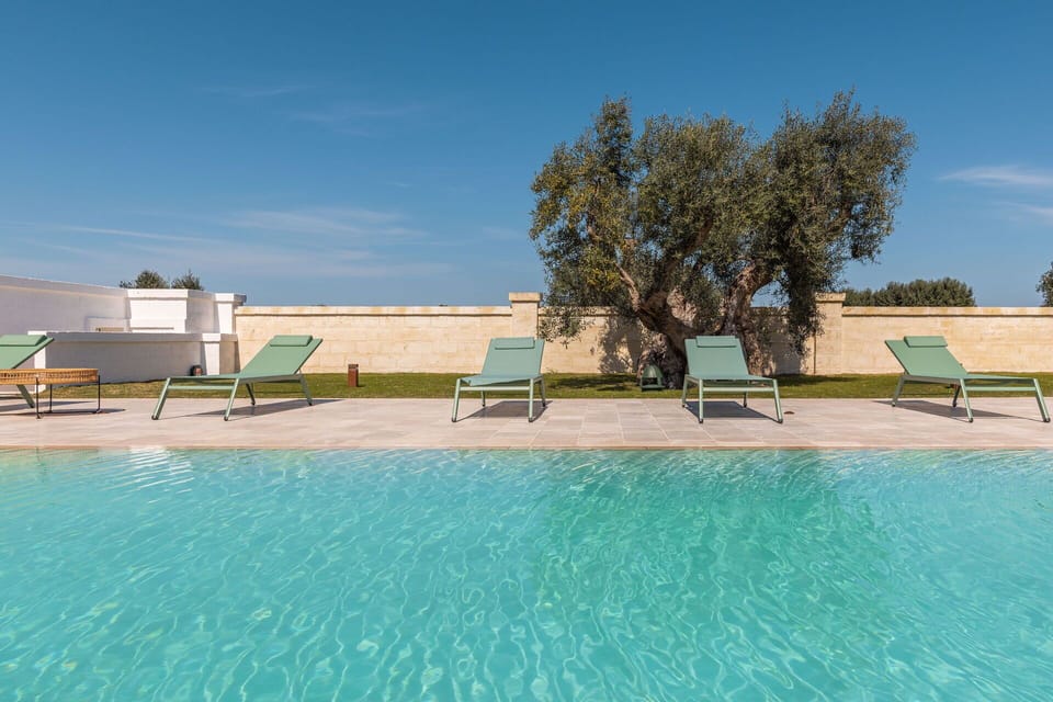 Activities, Amenities, Balcony / Terrace / Patio, Building Exterior, Main Entrance, Pool, Spring, Summer, Wellness