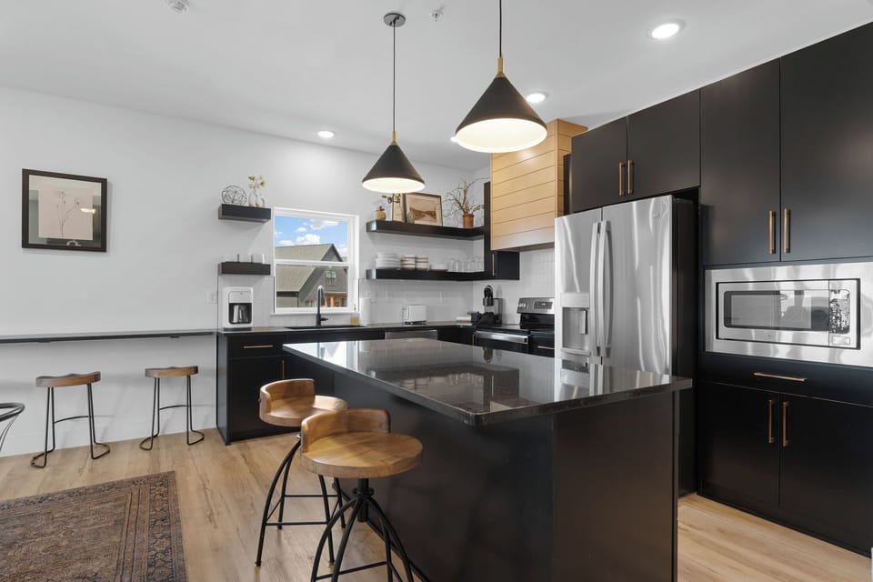 Large kitchen with luxury appliances and plenty of room to hang out together