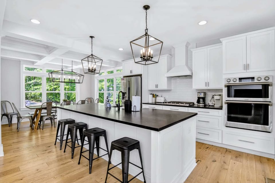 Kitchen - Oversize island, double ovens, and a sunny breakfast nook, every meal has a spot worth sitting at.