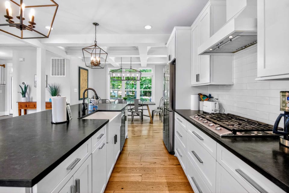 Kitchen - Gas cooktop, deep farmhouse sink, and a clear sightline to the breakfast nook, built for the cook who wants company.