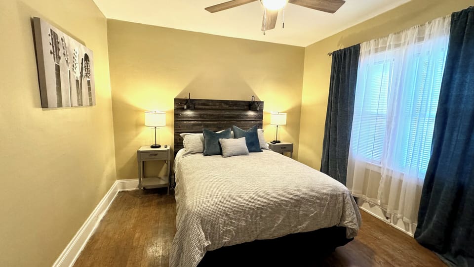 A queen sized bed where you can lounge after a full week of activities.