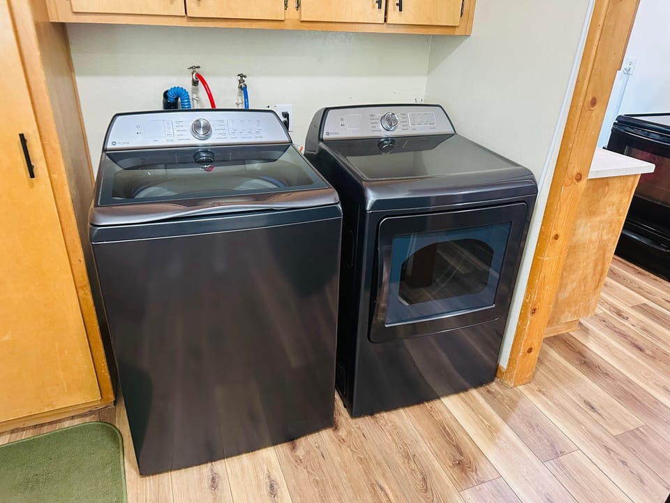 Convenient on-site laundry nook with washer and dryer, making longer stays easy and comfortable—perfect for refreshing clothes after mountain adventures or extended getaways.