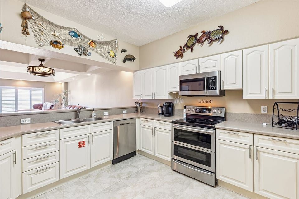 Enjoy a fully equipped kitchen with stainless steel appliances, ready for you to create anything from morning coffee to a gourmet dinner.