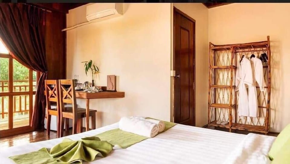 Standard Duplex, Balcony, Hill View | Desk, bed sheets