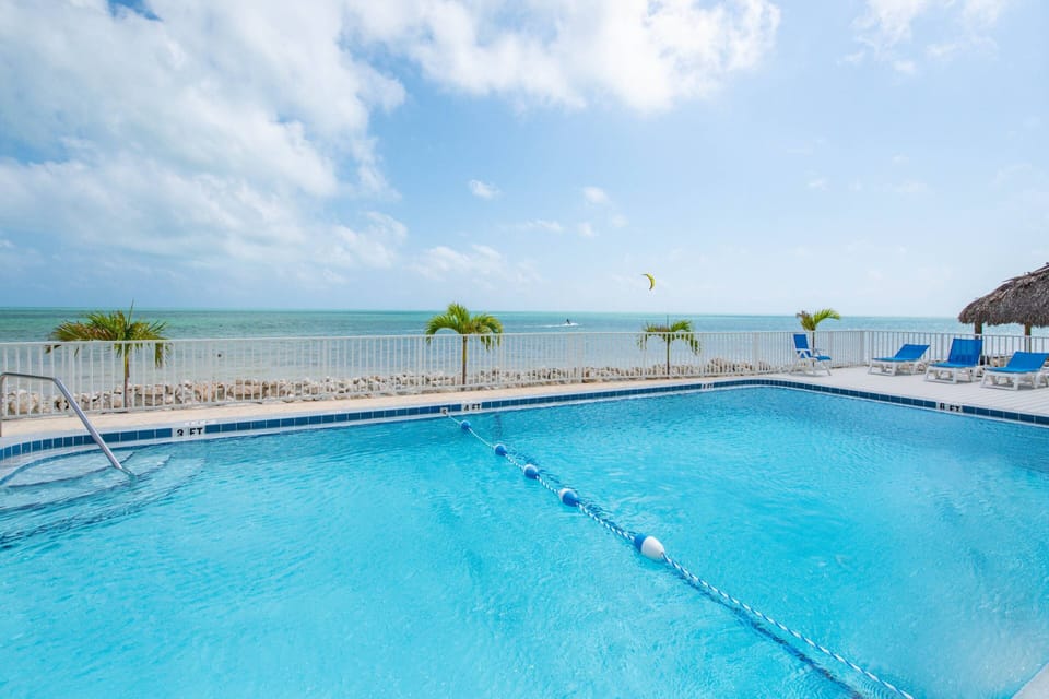 Watch the kids delight in splashing around and playing in the community pool, their laughter echoing through the air as they enjoy every moment.