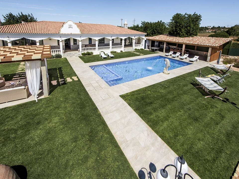 Property, Sky, Plant, Swimming Pool, Shade, Urban Design, Flooring, Grass, Outdoor Furniture, Leisure