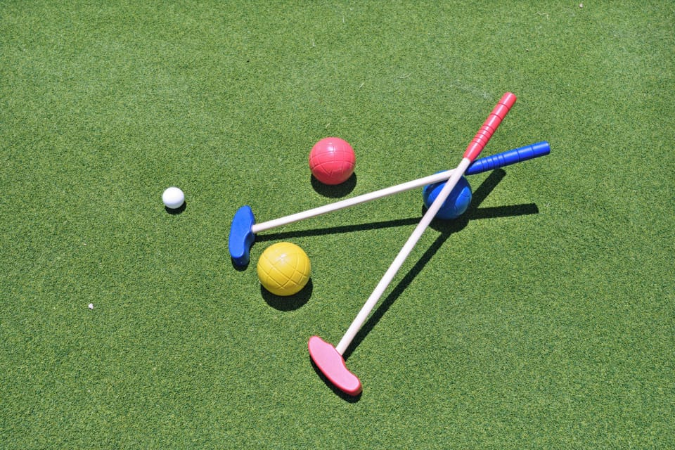 Unwind with some putting practice in the back yard.