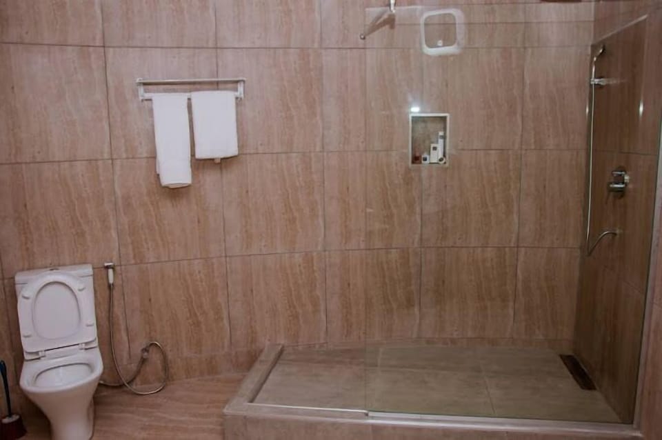 Economy Room, Balcony, City View | Bathroom | Free toiletries, hair dryer, towels, soap