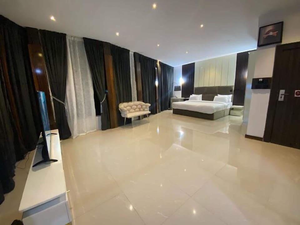 Deluxe Room, Balcony, City View | Desk, laptop workspace, free WiFi