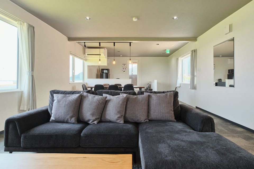 Comfort House, Sea View | Living area | 65-inch flat-screen TV with digital channels, Netflix, Hulu