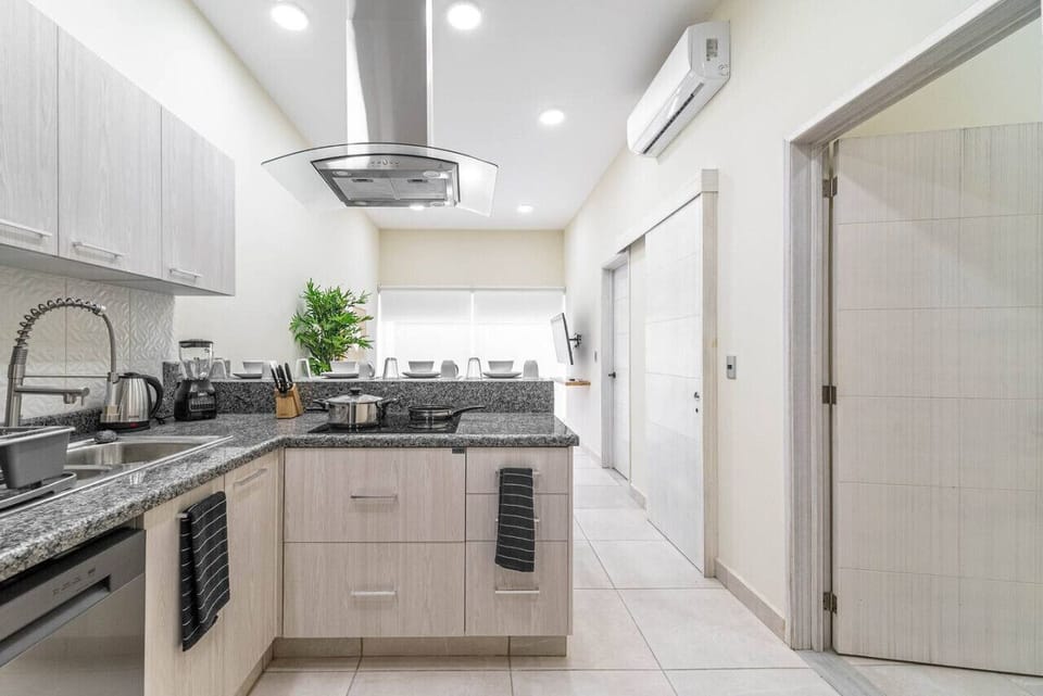Your culinary haven awaits! Enjoy the convenience of a spacious kitchen designed for home-cooked meals