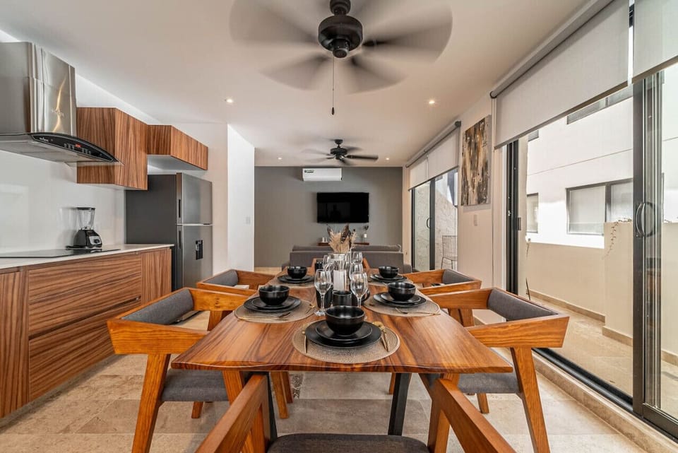 Gather around the table in this inviting dining area, perfect for sharing meals and memories with loved ones