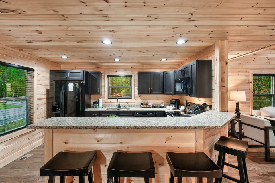 Additional seating for four at the upper countertop.