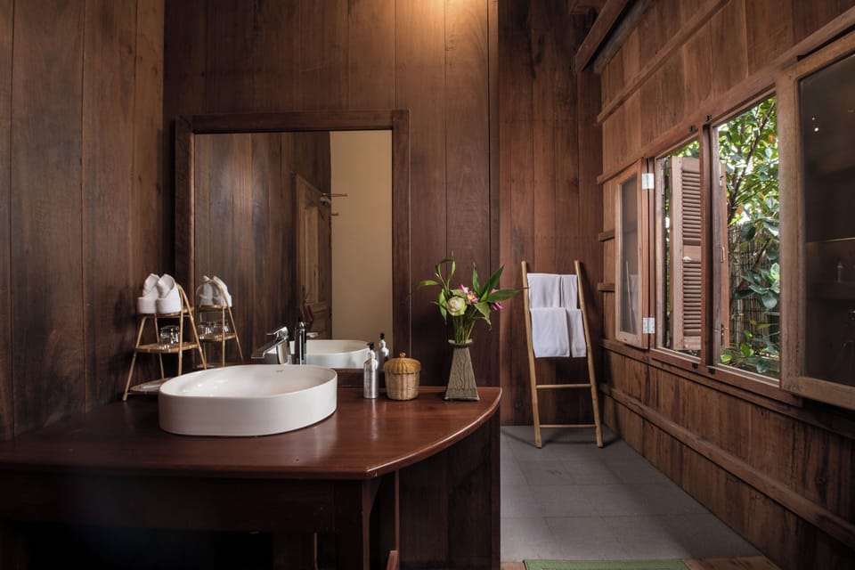 Two-Bedroom Suite | Bathroom | Separate tub and shower, rainfall showerhead, free toiletries