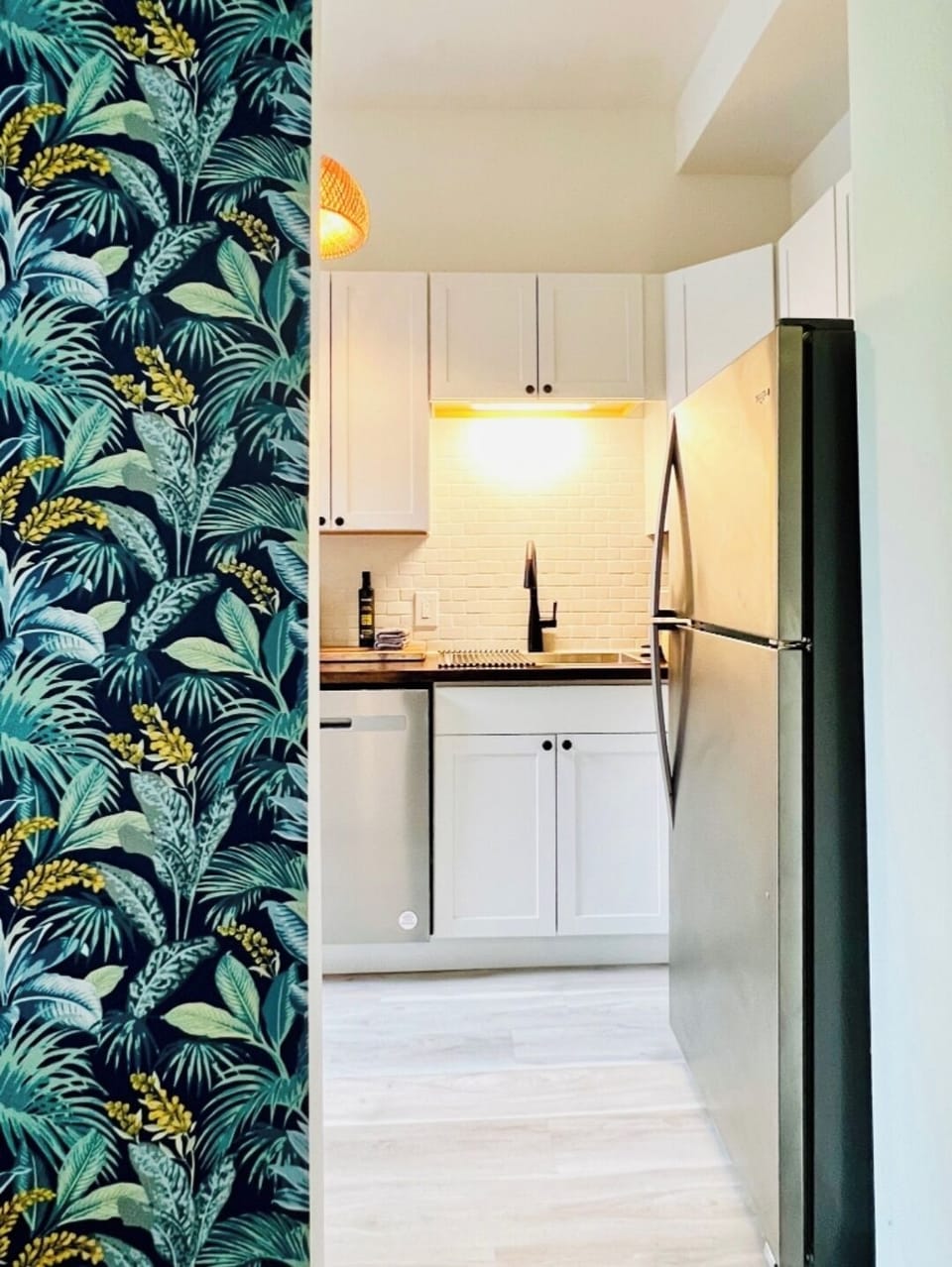 Brand new full size refrigerator in the newly remodeled kitchen