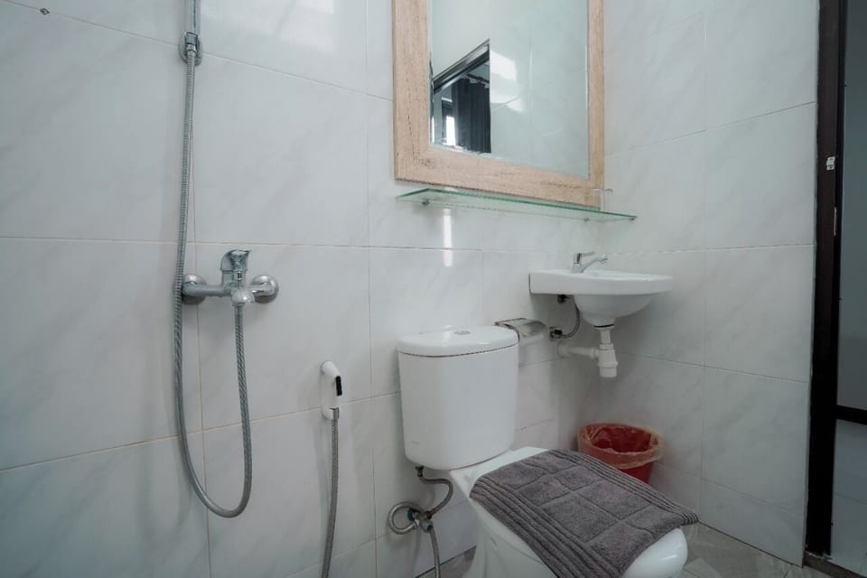 Shower, slippers, towels, soap
