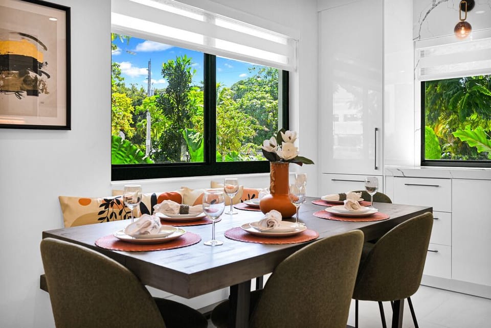 Elegant dining area with lush views, perfect for intimate gatherings.