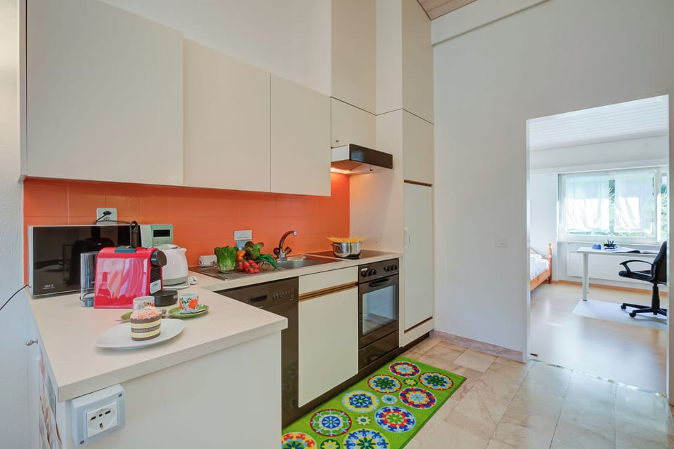Family Apartment, 2 Bedrooms, 2 Bathrooms, Lakeside (Miralago Lakeview Morcote With Pool) | Private kitchen | Espresso maker