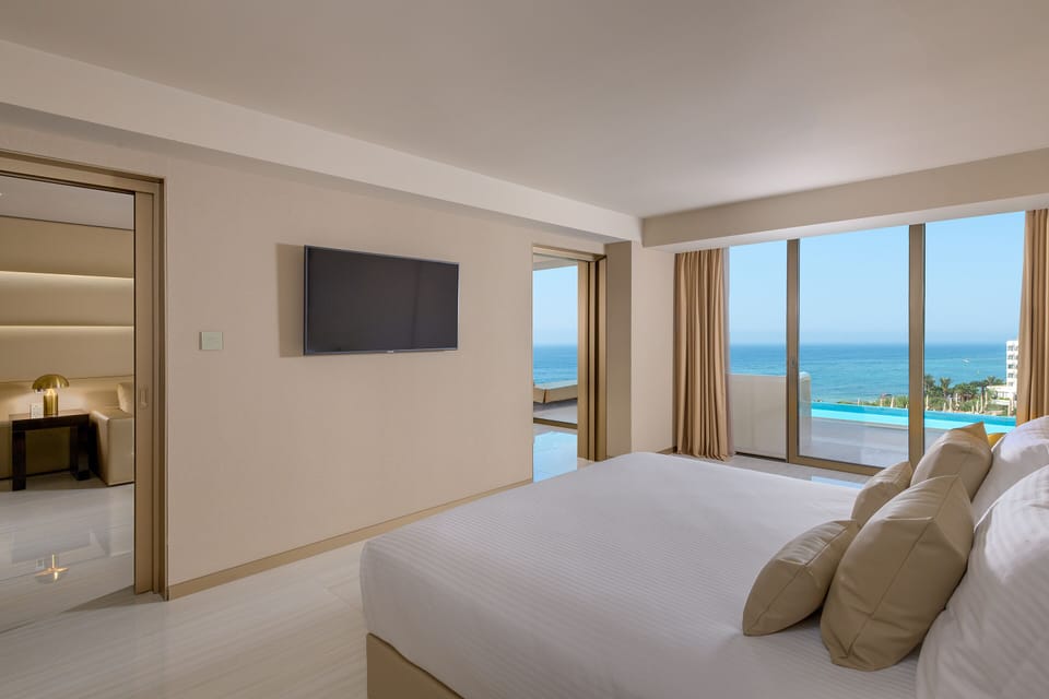 Suite, Sea View (Prestige Swim-up) | Hypo-allergenic bedding available, memory foam beds, minibar