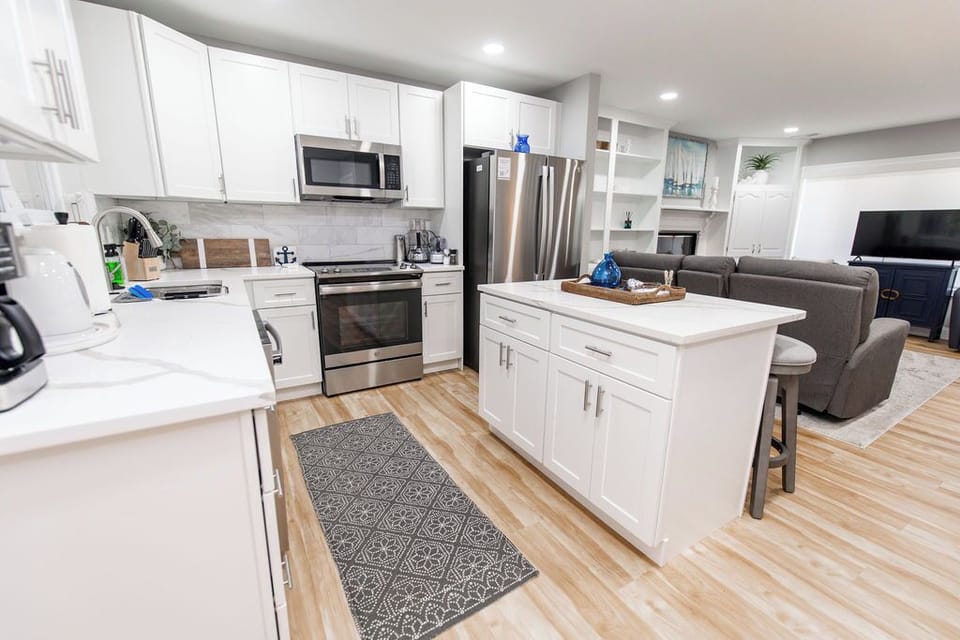 Recently renovated kitchen with quartz countertops, stainless steel appliances, and all the gadgets, tools, and amenities you need to cook wonderful meals.
