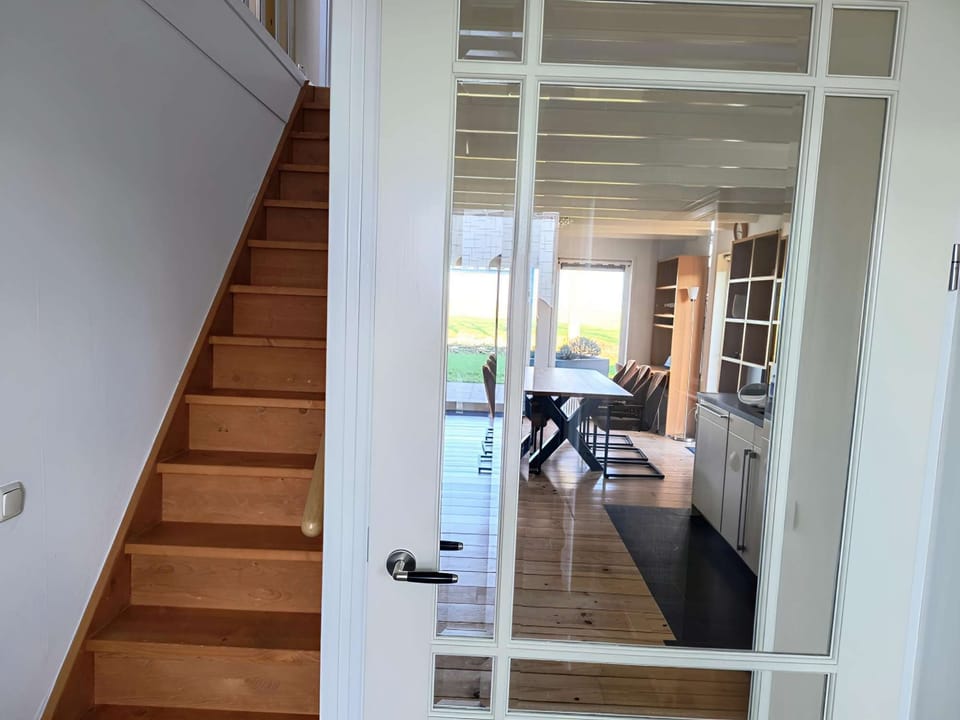 Hallway with stairs to the upper floor