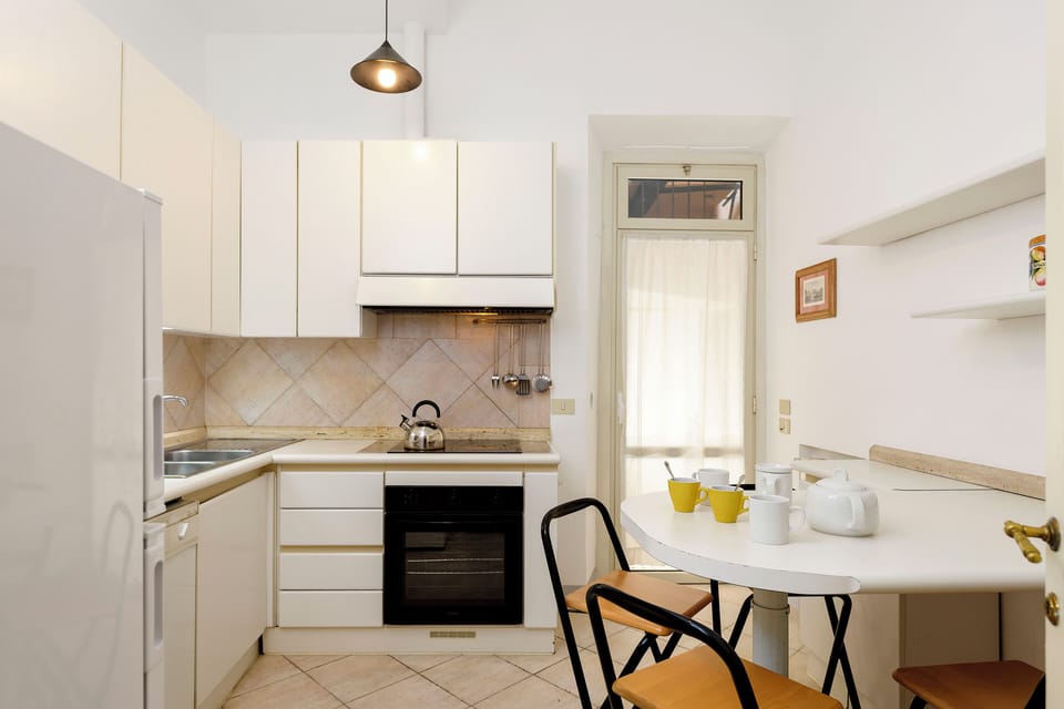 Deluxe Condo | Private kitchen | Dining tables