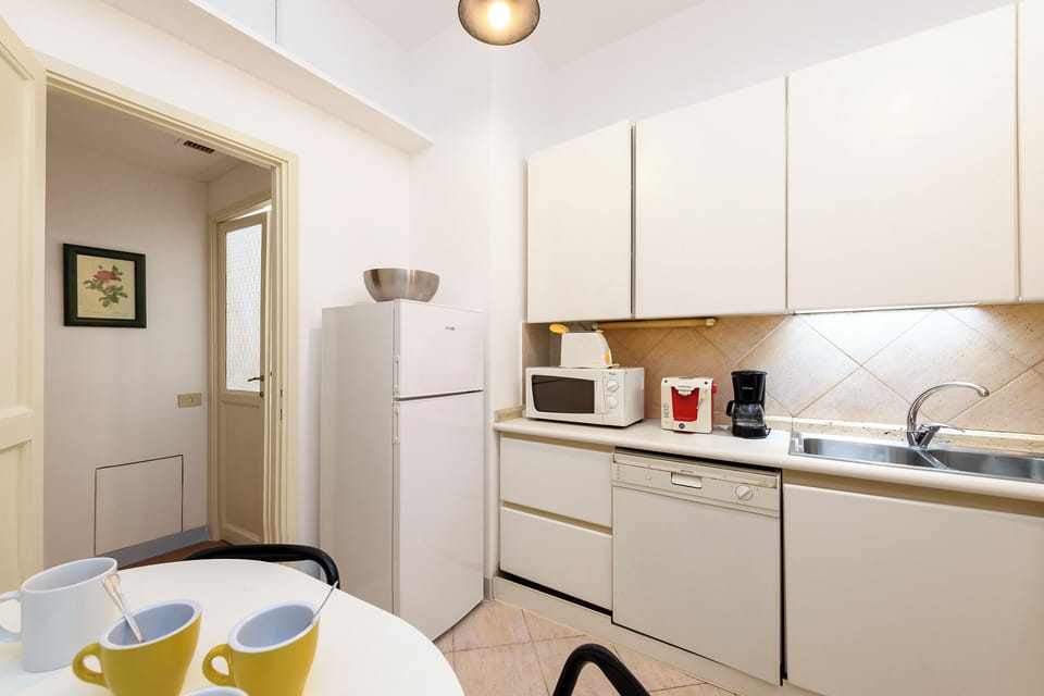 Deluxe Condo | Private kitchen | Dining tables