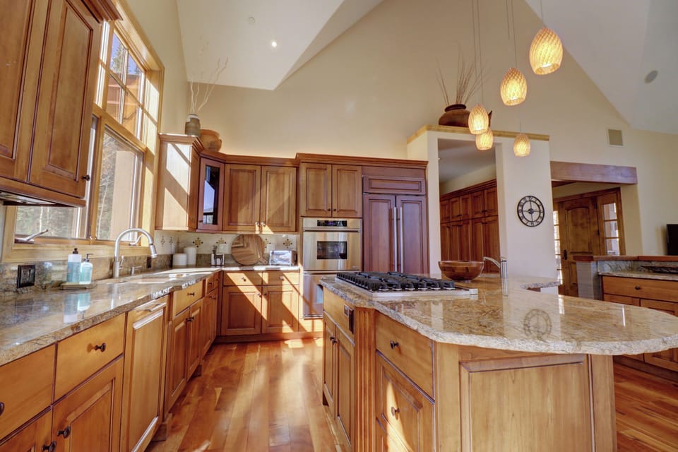 Full stocked kitchen with updated appliances and a great open concept to dining and living area.