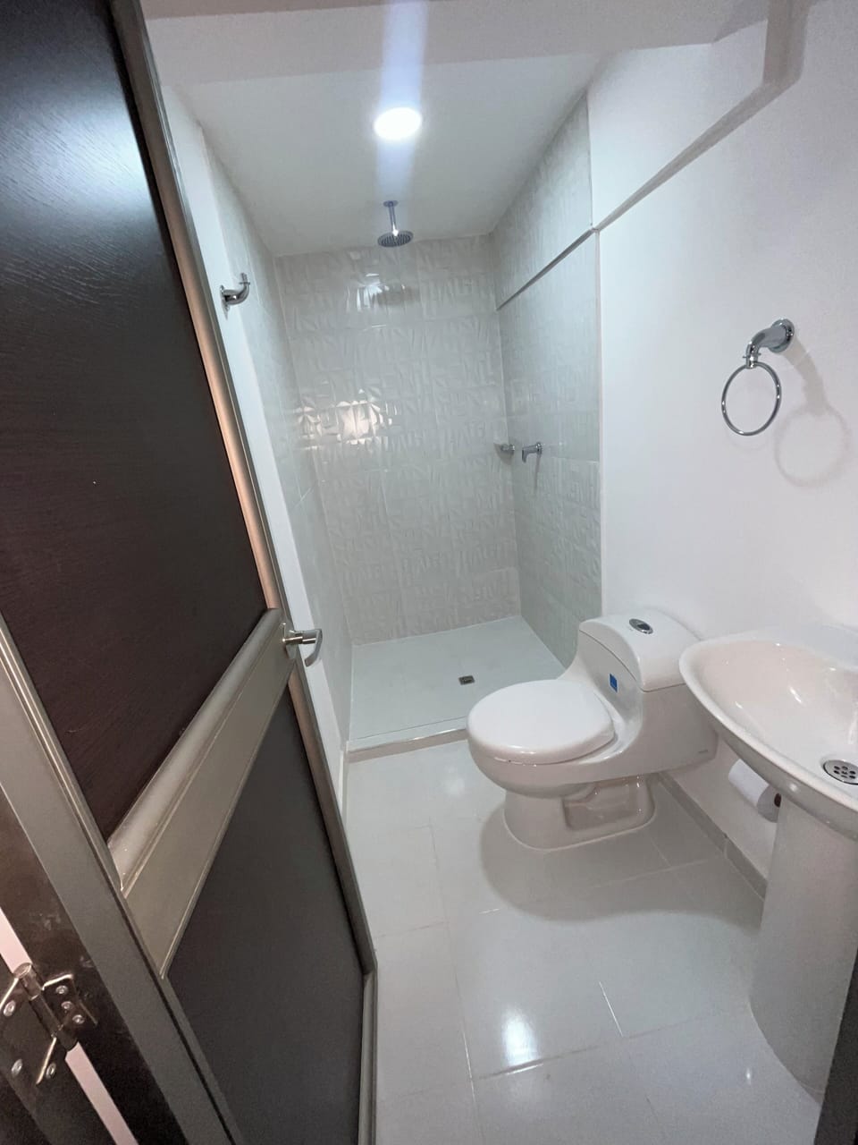 Shower, towels, soap, toilet paper