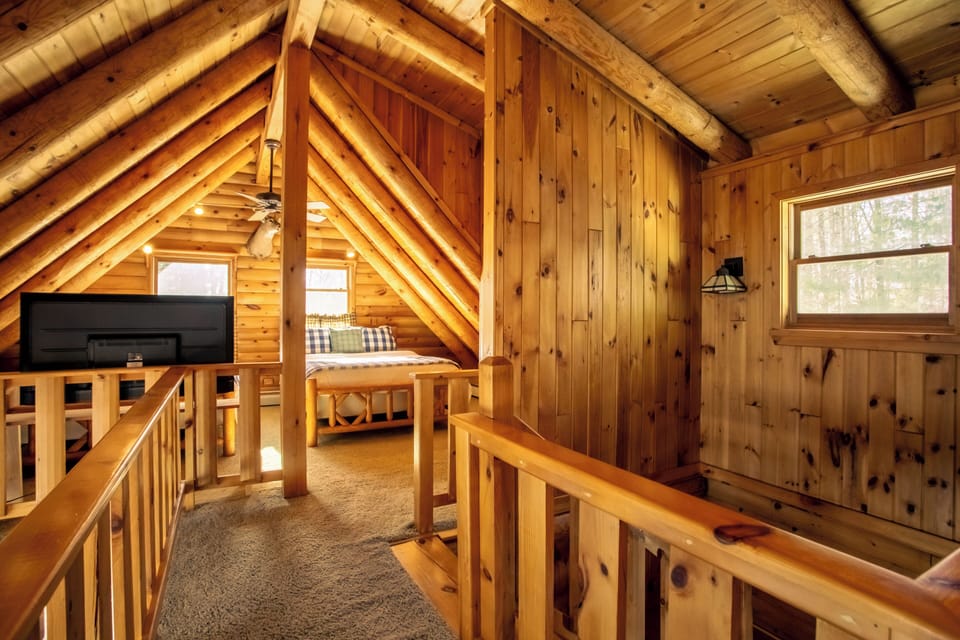 Cozy up in the attic sleeping area with two comfortable queen beds. 