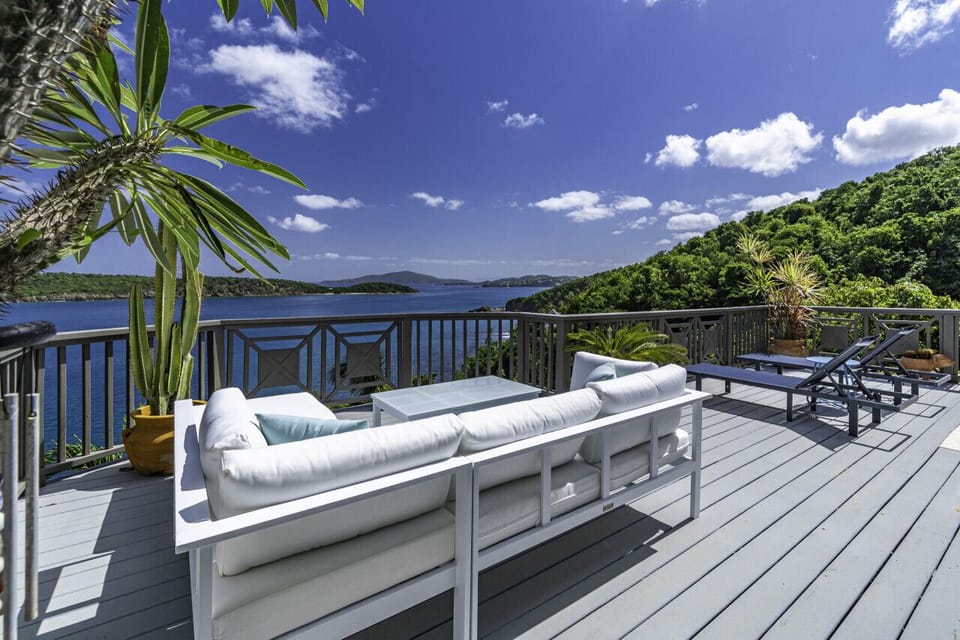 Spacious deck with comfy outdoor furniture and an incredible view!