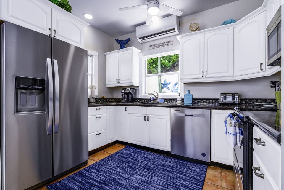 Spacious, well-appointed kitchen with AC.