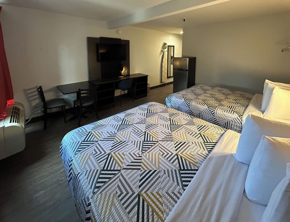Desk, blackout drapes, free WiFi, bed sheets