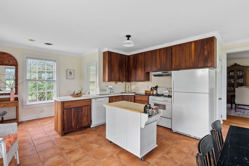 Kitchen Haven: Whip up culinary delights in this bright, charming space! Perfect for foodies!