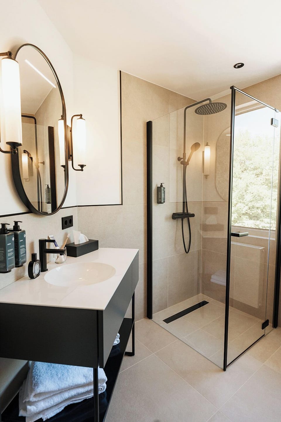 Shower, hair dryer, slippers, towels