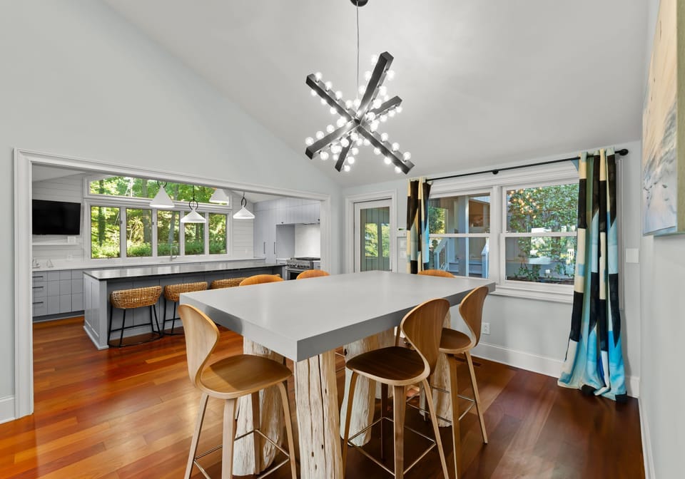 High top table off the kitchen area with seating for 6
