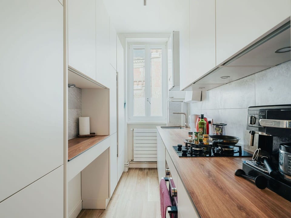 Cabinetry, Building, Countertop, Kitchen Stove, Interior Design, Wood, Kitchen Appliance, Kitchen, Flooring, Floor