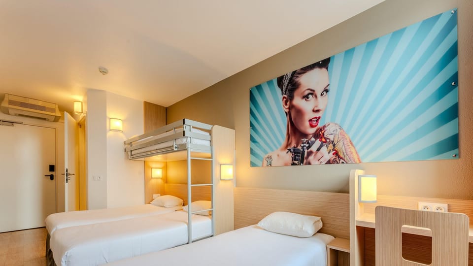 Standard Room, Multiple Beds | Premium bedding, desk, laptop workspace, blackout drapes
